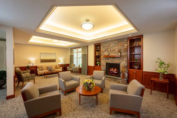 Cozy common area with comfortable seating and a fireplace