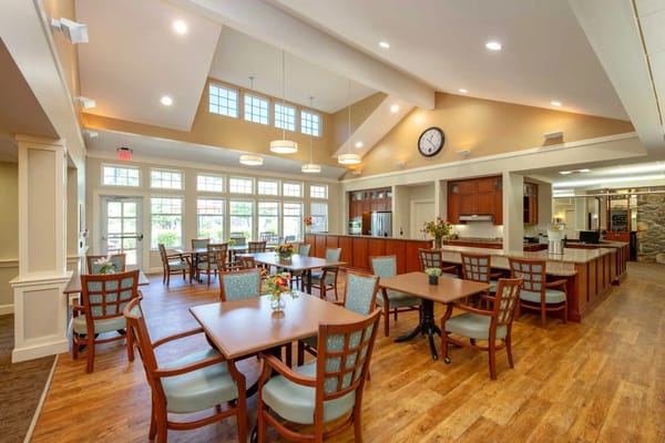 Bright dining area with tables and chairs