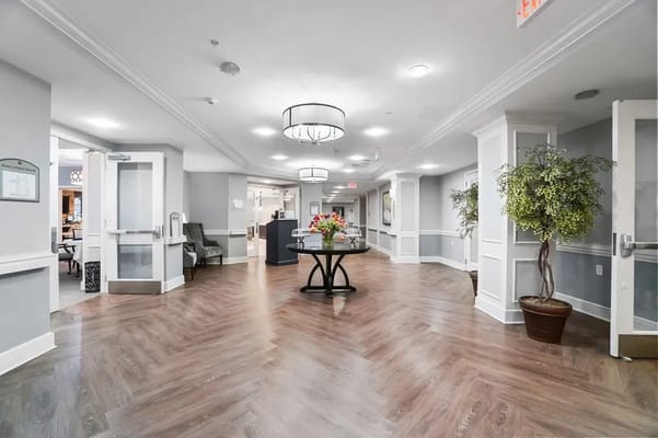 Bright and inviting lobby area with floral arrangement