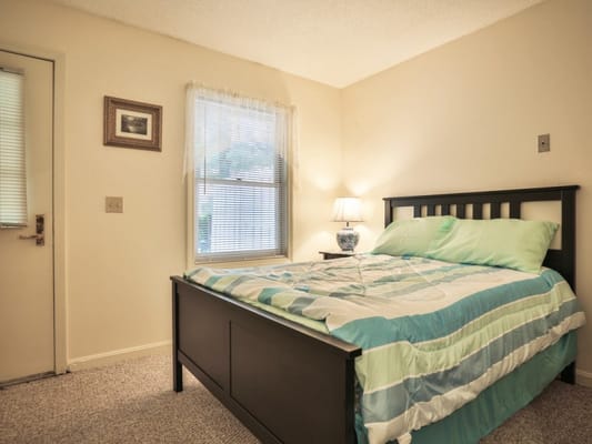 Private bedroom with a bed and window