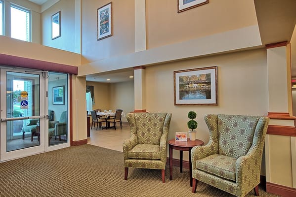 Interior common area with chairs and dining space