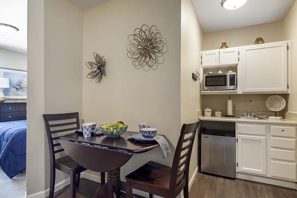 Cozy dining area in a resident unit with kitchen
