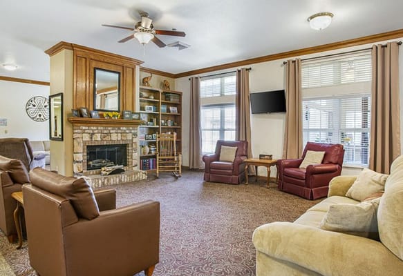 Cozy common area with seating and fireplace