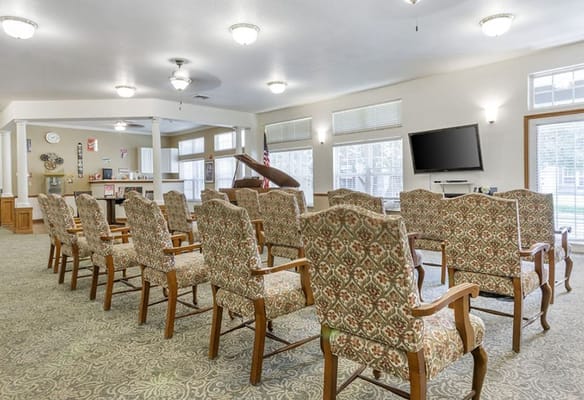 Seating arranged in a common area of the facility