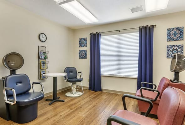 Hair salon area with styling chairs and decor