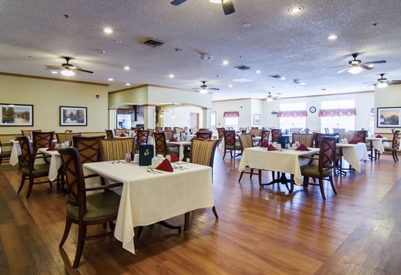 Bright dining area with tables set for meals