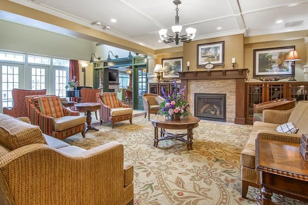 Cozy common area with comfortable seating and a fireplace