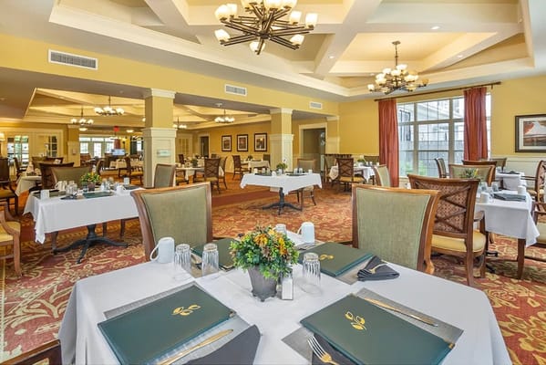 Elegant dining area with well-set tables and decor
