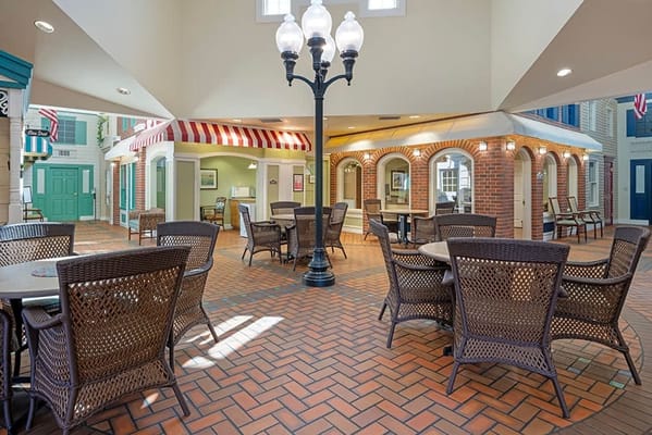 Interior common area with seating and lighting fixtures