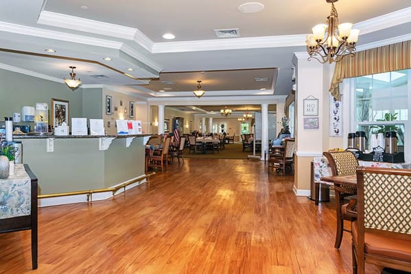 Bright interior of a dining area with wooden floors