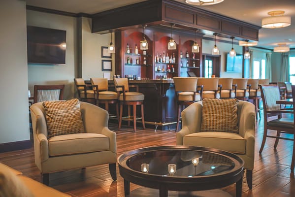 Common area with seating and a bar