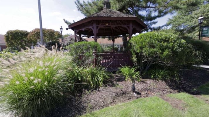 Gazebo in a landscaped garden at the facility