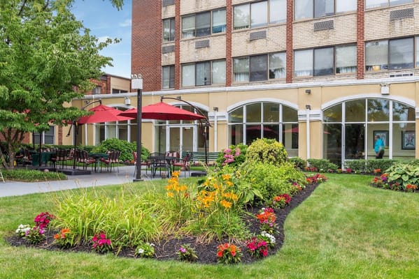 Beautiful garden area with seating and umbrellas