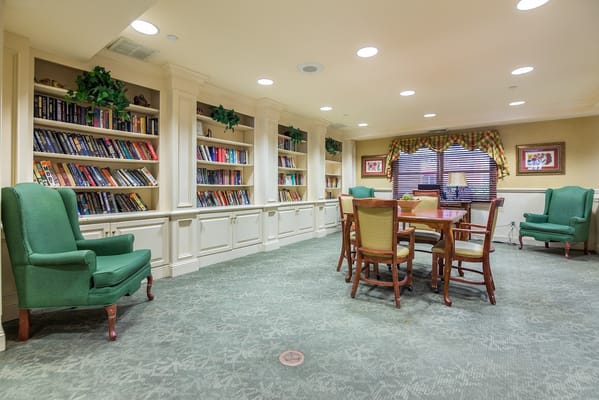 A cozy interior library area with bookshelves