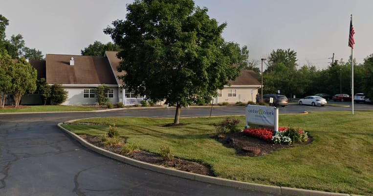 Exterior view of Cedar Ridge facility with landscaping