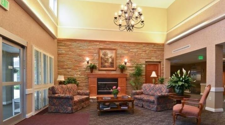 Interior common area with seating and fireplace