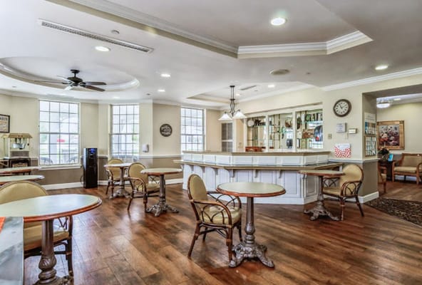 Interior view of a common area with tables and chairs