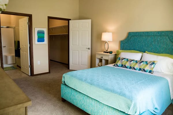 Well-furnished private resident room with a cozy bed