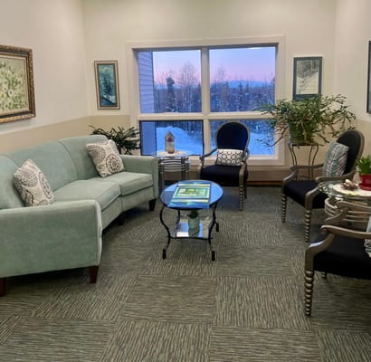 Cozy common area with seating and plants