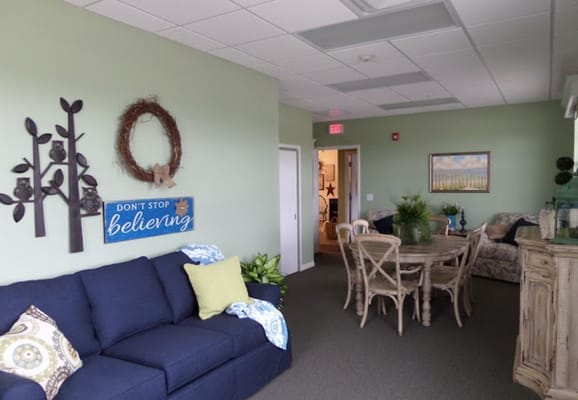 Bright common area with seating and decor