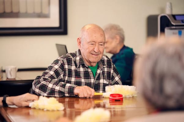 Residents engaged in a group activity in a common area