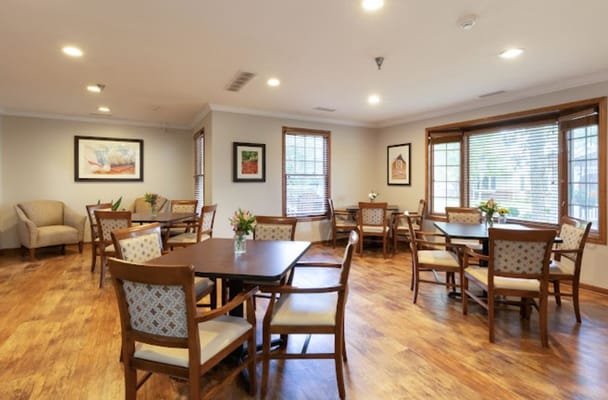 Bright dining room with tables and chairs