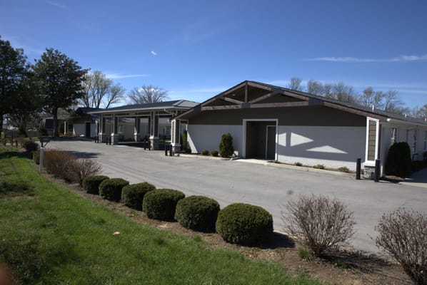Exterior view of the assisted living facility with landscaping