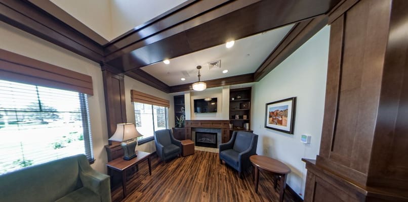 Bright common area with comfortable seating and decor