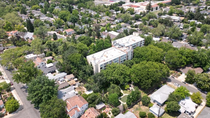 Aerial view of Eskaton Land Park surrounded by trees and homes