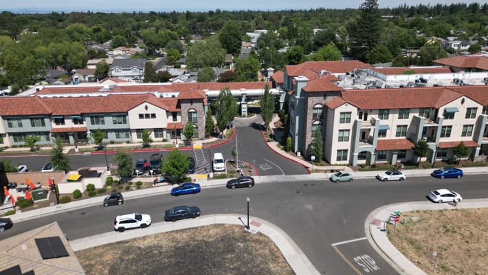 Aerial view of the facility campus with surrounding greenery