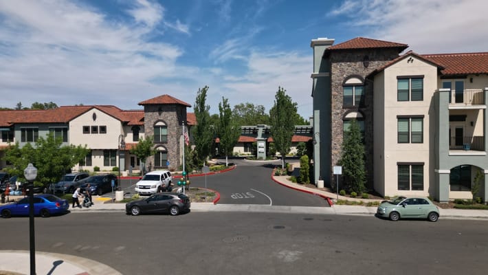 Exterior view of Oakmont of East Sacramento with landscaped entrance