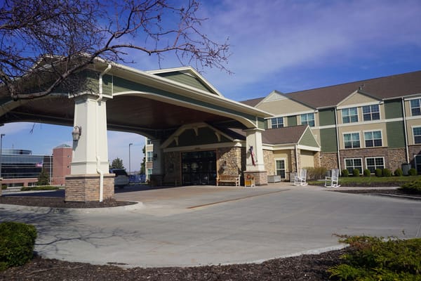 Entrance of Remington Heights Retirement facility with covered driveway