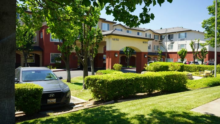 View of the assisted living facility exterior and landscaped area