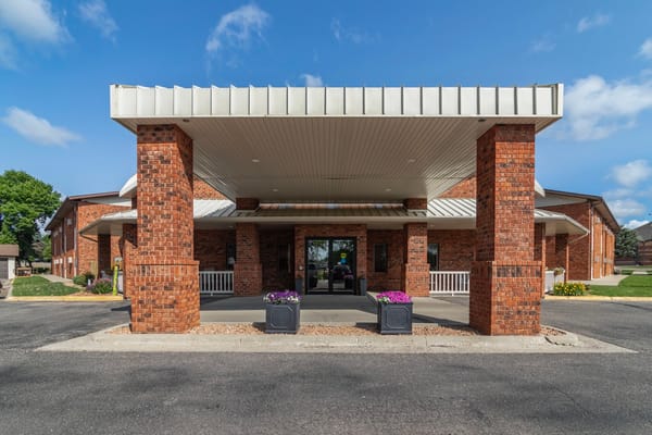 Front entrance of Derian Lodge with flower planters