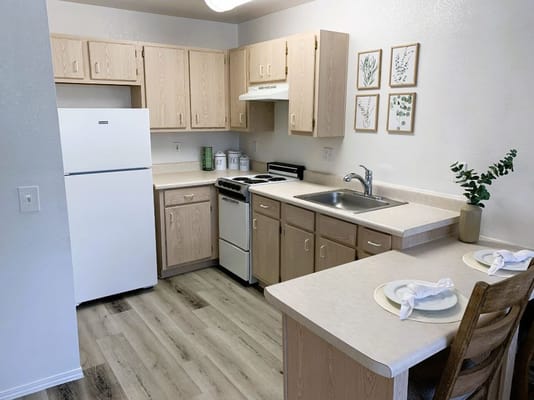 Bright kitchen area with modern appliances
