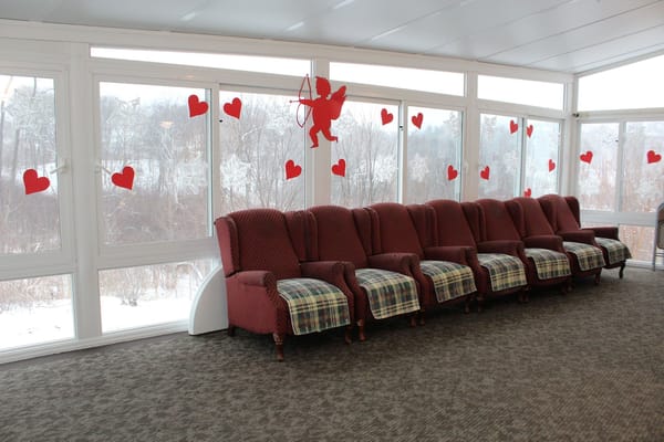 Seating area decorated with hearts and winter scenery