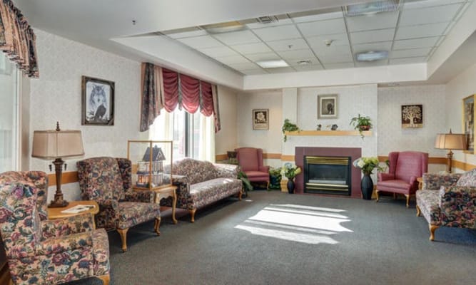 Bright common area with comfortable seating and decor