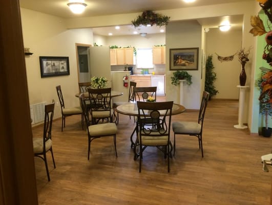Interior view of a dining area with tables and chairs