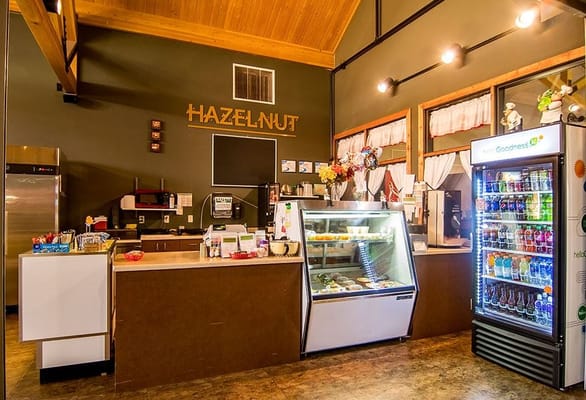 Interior view of Hazelnut Cafe with snack displays and vending machine