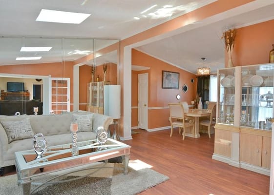 Bright common area with seating and dining space