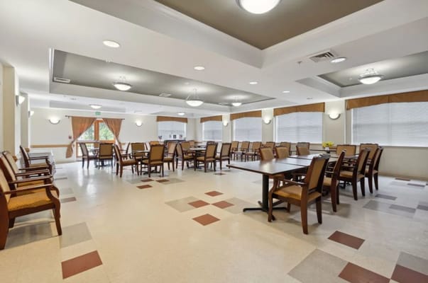 Bright dining room with tables and chairs