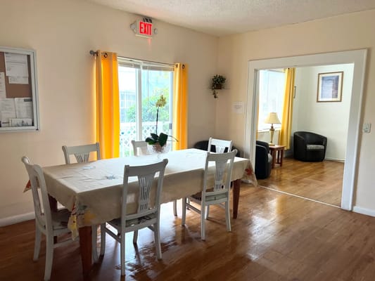 Common area with a dining table and chairs.