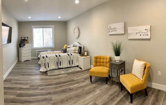 Well-furnished resident room with decorative elements