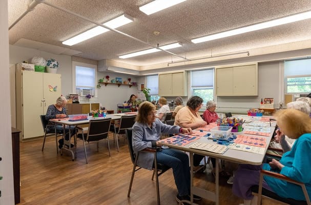 Residents engaged in an arts and crafts activity