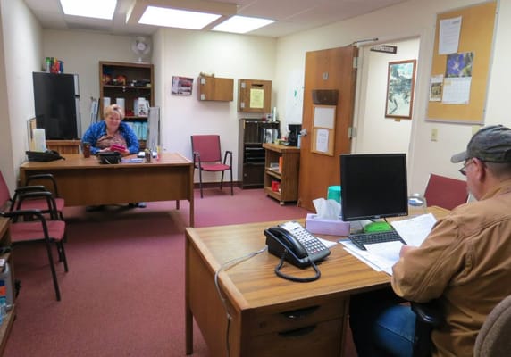 Interior view of an office space with staff