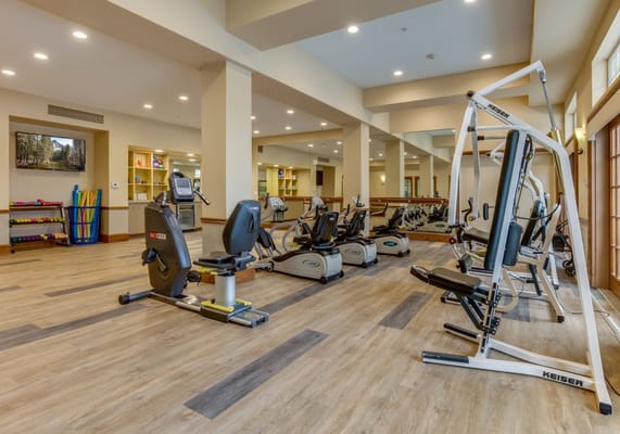 A well-equipped fitness center with exercise machines