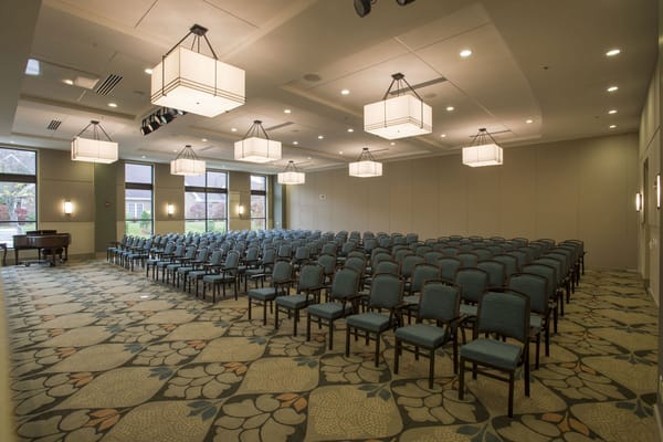 Spacious activity room with rows of chairs