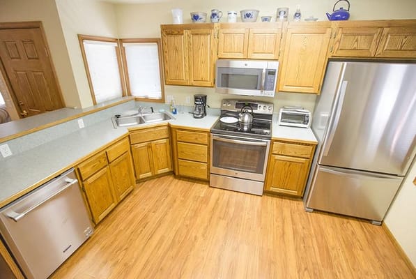 Bright kitchen area with modern appliances