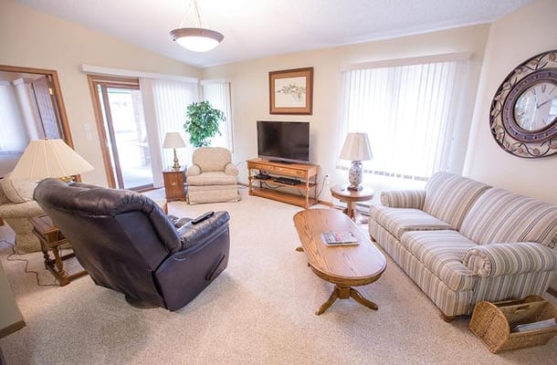 Cozy living room with comfortable seating and a TV