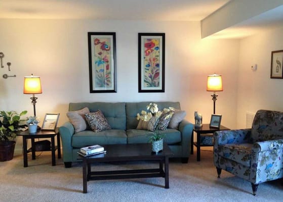 Cozy living room with floral decor and furniture